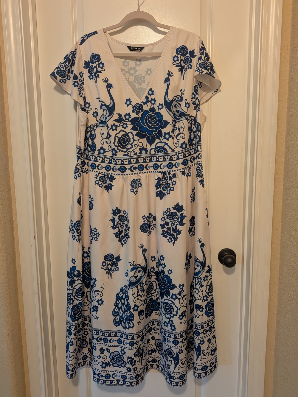 BloomChic White Midi Dress with Blue Floral & Peacock Motif